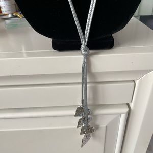 Gray roped lariat with hammered dangling hearts. OS